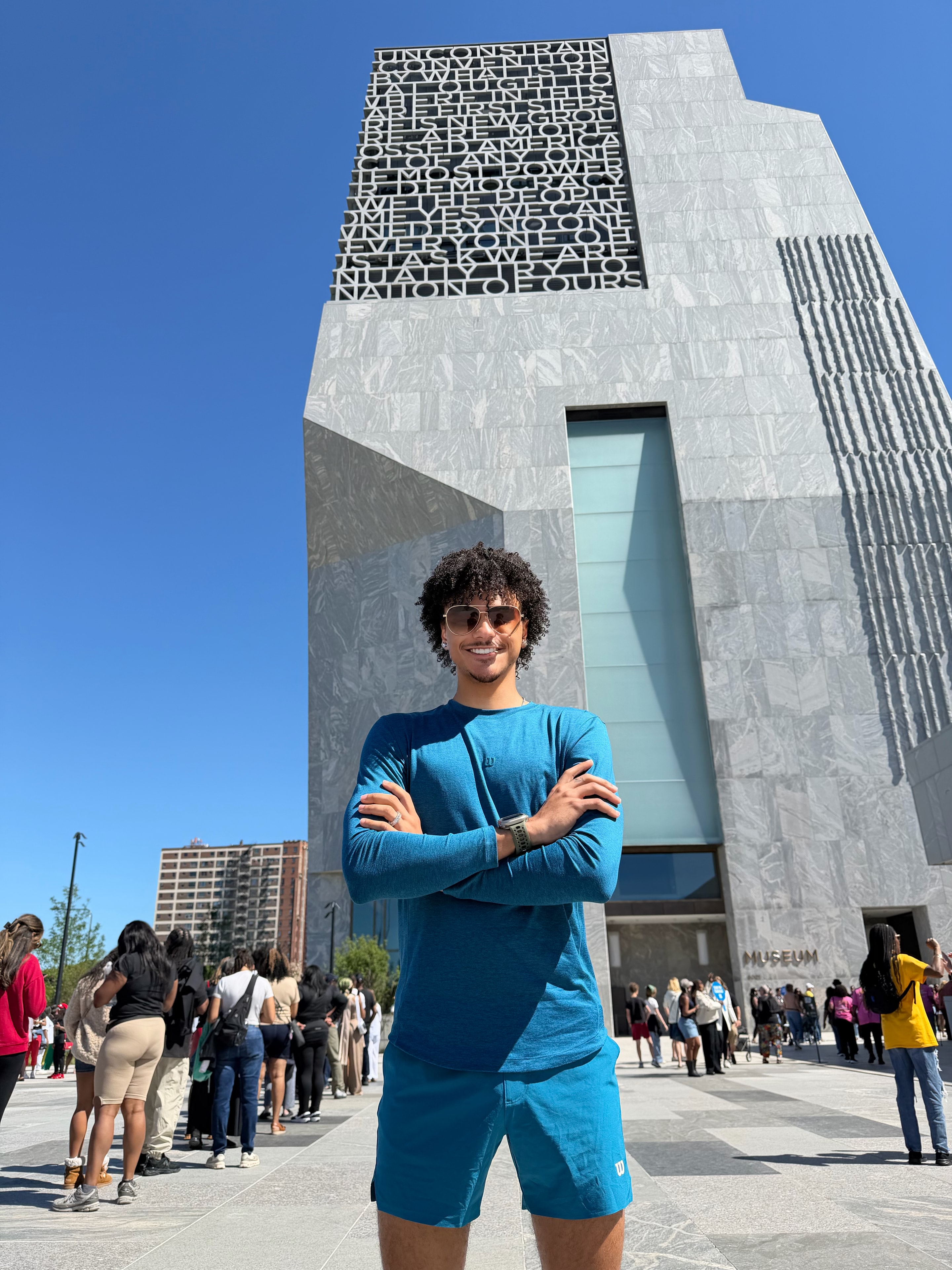 Aden Golden standing in front of the Barack Obama Presidential Center on the opening day